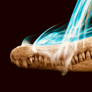 Front of an alligator skull with blue smoke