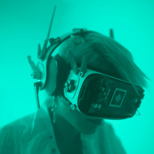 Person wearing a cyberpunk VR headset